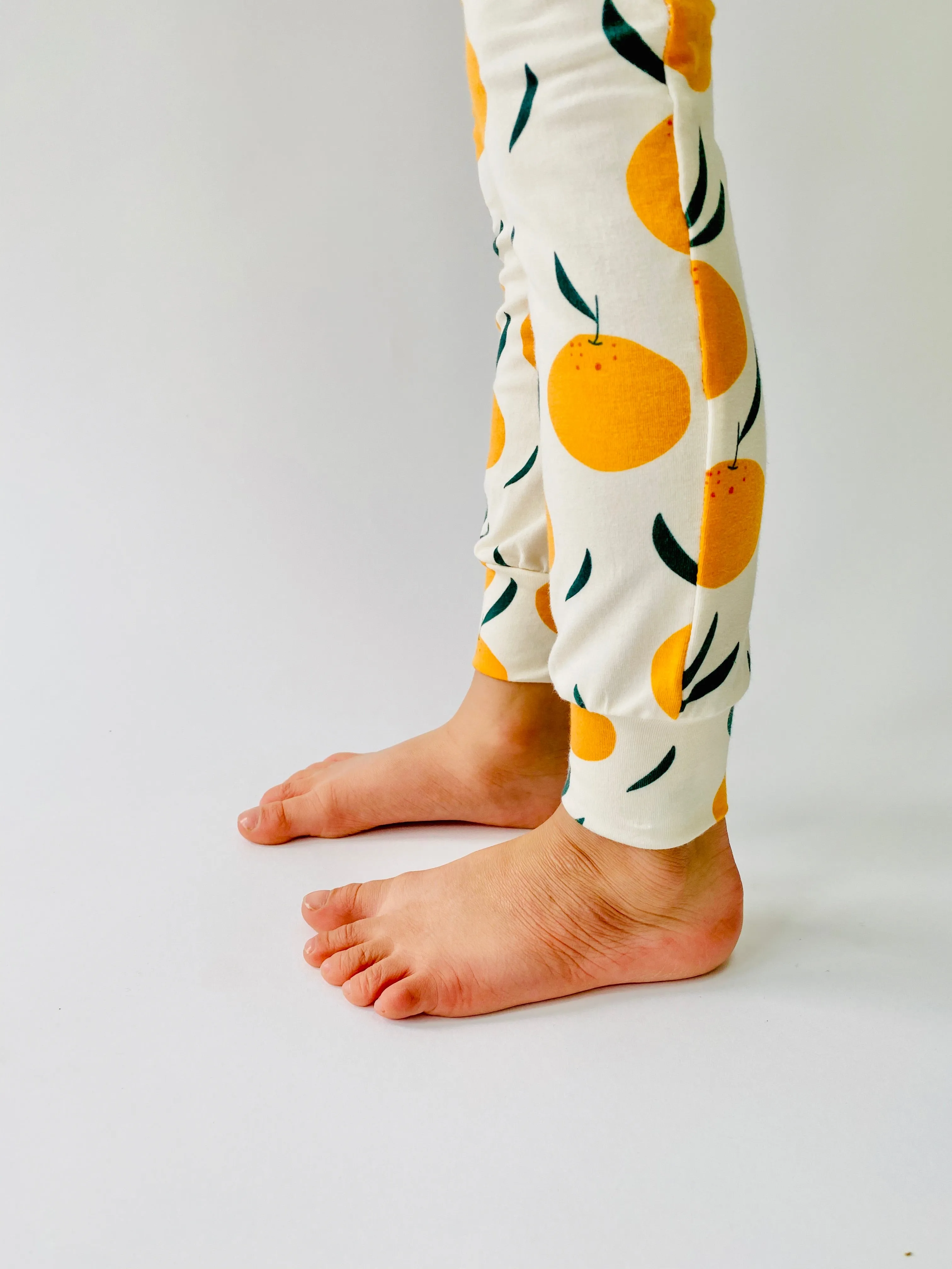 Eddie & Bee organic cotton leggings in Cream "Clementine Grove" print.